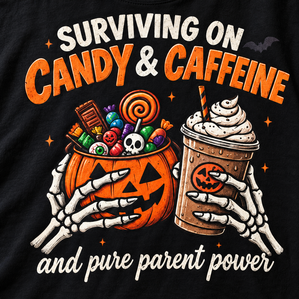 Print close-up of the "Surviving on Candy & Caffeine" Halloween parent T-shirt by SarcasmArt in Black: skeleton hands holding a jack-o'-lantern candy bucket and a pumpkin iced latte under SURVIVING ON CANDY & CAFFEINE and pure parent power.