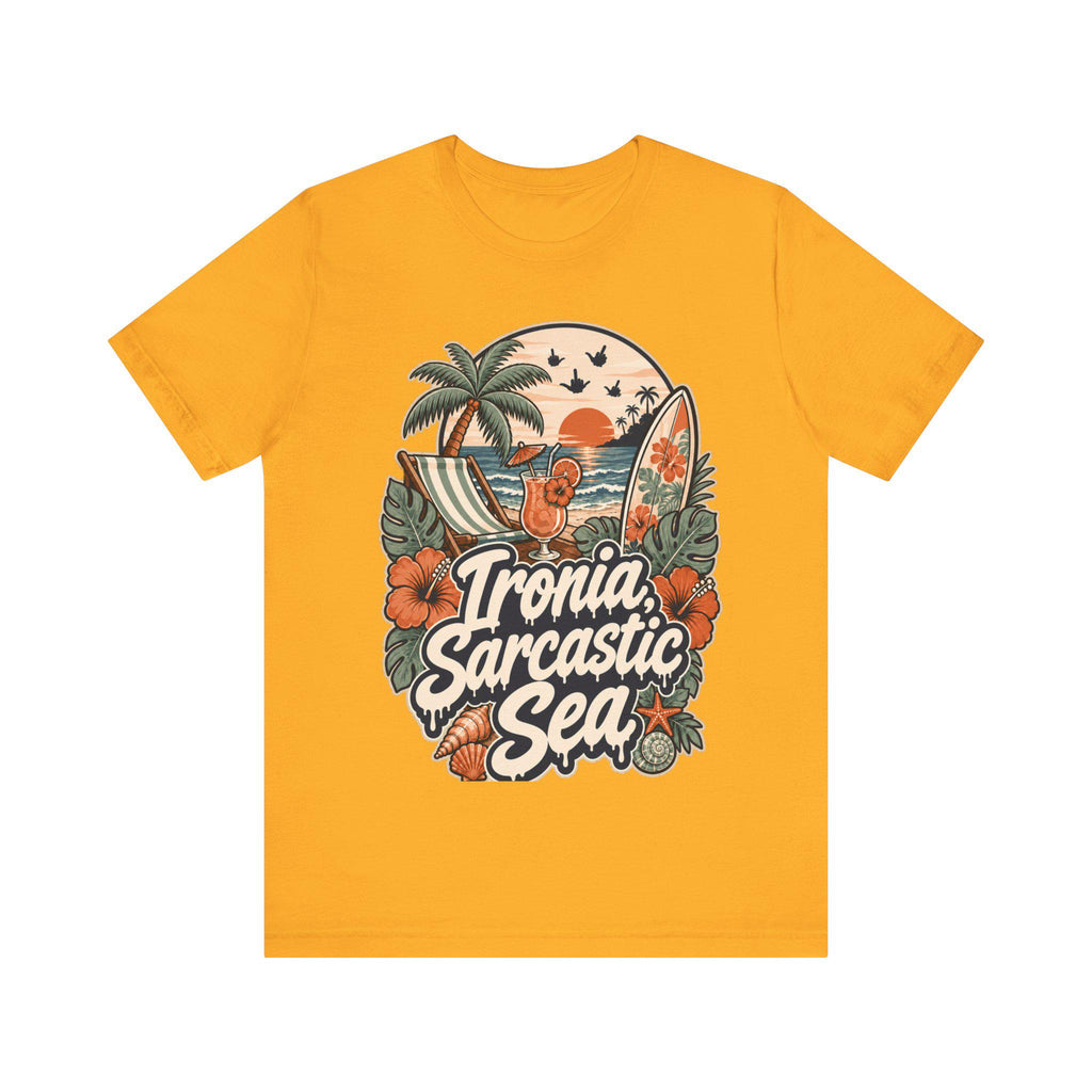 "Ironia, Sarcastic Sea" retro beach T-shirt by SarcasmArt in golden yellow on a plain background, showing a vintage tropical beach scene with palm tree, deck chair, cocktail, surfboard, sunset, hibiscus flowers and shells around the script Ironia, Sarcastic Sea.