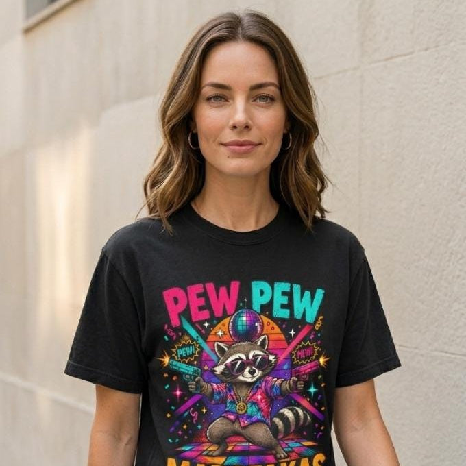 Woman in jeans wearing the "Pew Pew Madafakas" raccoon meme T-shirt by SarcasmArt in Black.