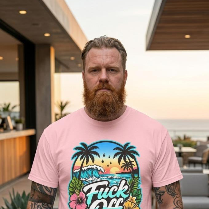 Bearded man at a beach bar at sunset wearing the "F*ck Off" retro tropical beach T-shirt by SarcasmArt in Pink.