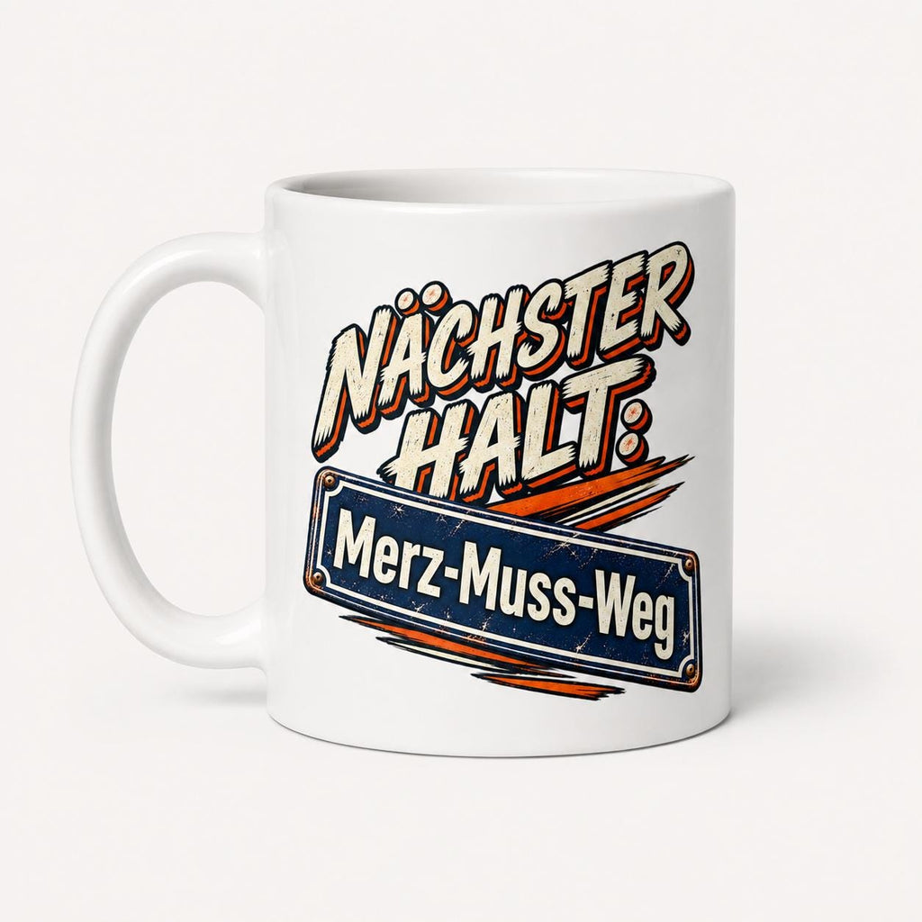 The "Nächster Halt: Merz-Muss-Weg" German political satire coffee mug by SarcasmArt on a white background, handle on the left.