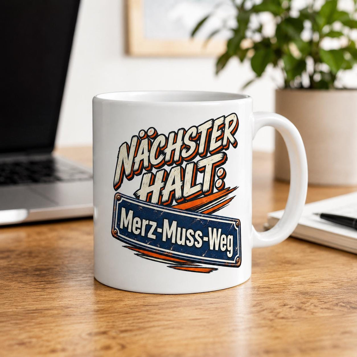 "Nächster Halt: Merz-Muss-Weg" German political satire coffee mug by SarcasmArt: white 11 oz ceramic mug with retro comic lettering NÄCHSTER HALT: above a blue street-sign style plate reading Merz-Muss-Weg with orange speed lines, on a wooden desk next to a laptop.