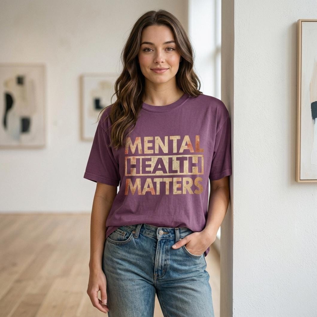 Woman in jeans wearing the "Mental Health Matters" vintage awareness T-shirt by SarcasmArt in Berry, a supportive awareness shirt.