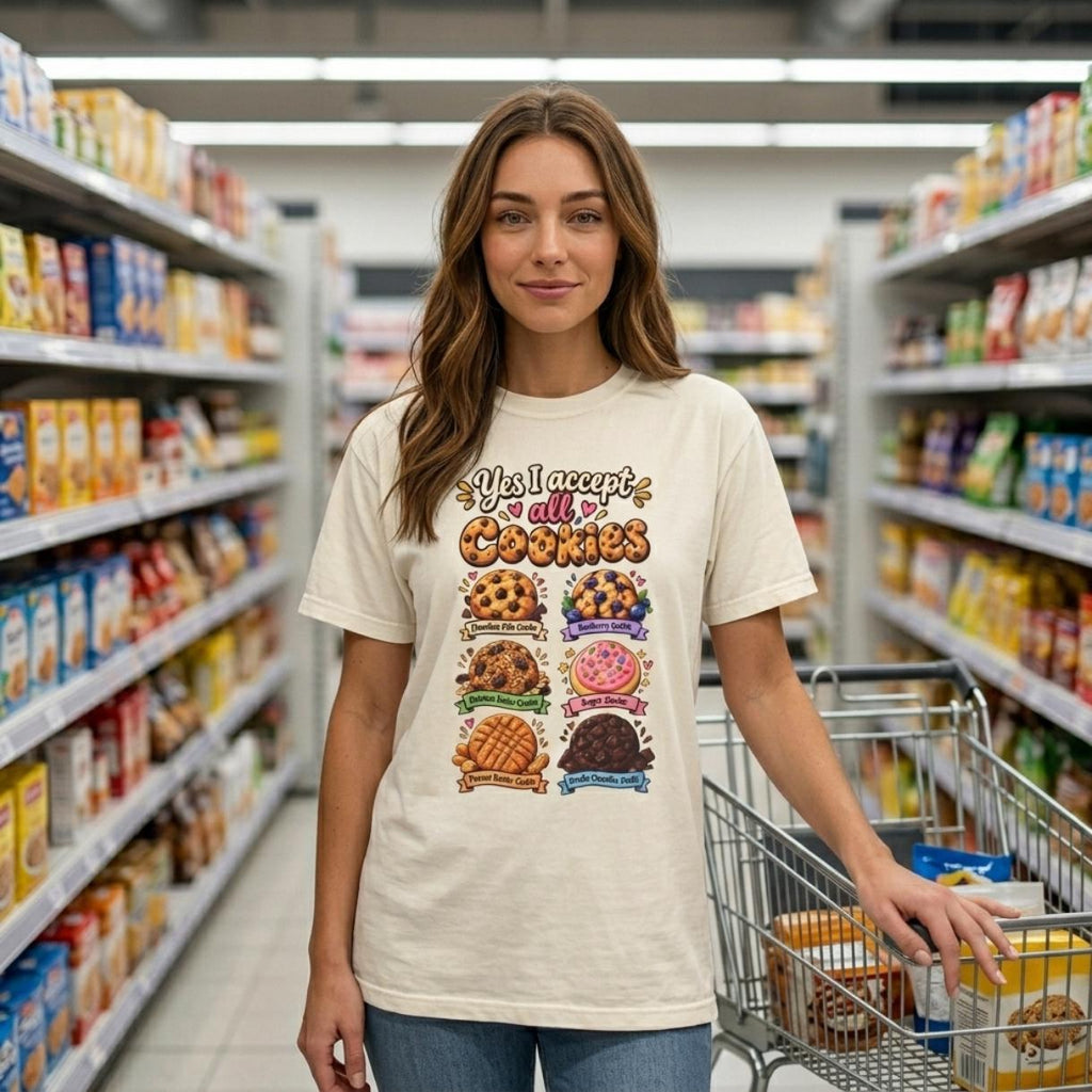 Woman with a shopping cart in a supermarket wearing the "Yes, I Accept All Cookies" funny programmer T-shirt by SarcasmArt in Ivory.