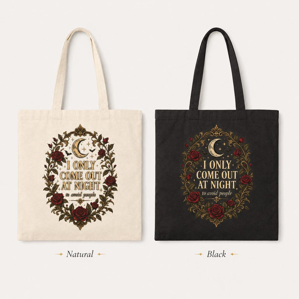 The "I Only Come Out at Night to Avoid People" gothic canvas tote bag by SarcasmArt in Natural and Black side by side.
