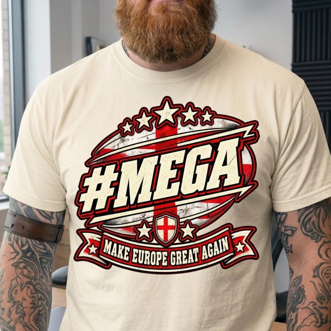 Close-up of the "#MEGA Make Europe Great Again" England T-shirt by SarcasmArt in Ivory worn by a bearded man, showing the St George cross badge.