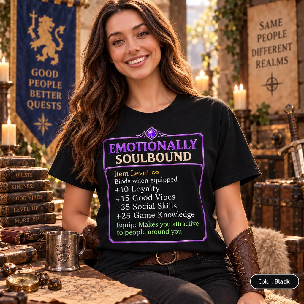 Smiling woman in a fantasy tavern wearing the "Emotionally Soulbound" funny RPG gamer T-shirt by SarcasmArt in Black – the purple item tooltip print pops on the dark shirt.