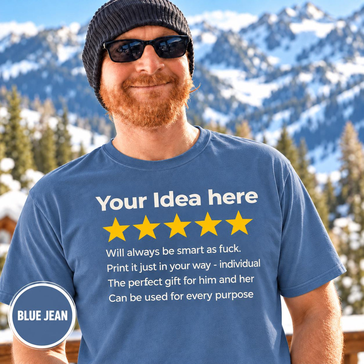 Bearded man in a beanie and sunglasses in front of snowy mountains wearing the personalized golden 5-star review T-shirt by SarcasmArt in Blue Jean, with your custom title, five golden stars and four lines of your own review text in white.