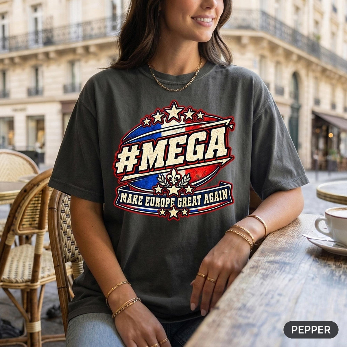 Woman holding a coffee at a café terrace wearing the "#MEGA Make Europe Great Again" France T-shirt by SarcasmArt in Pepper.