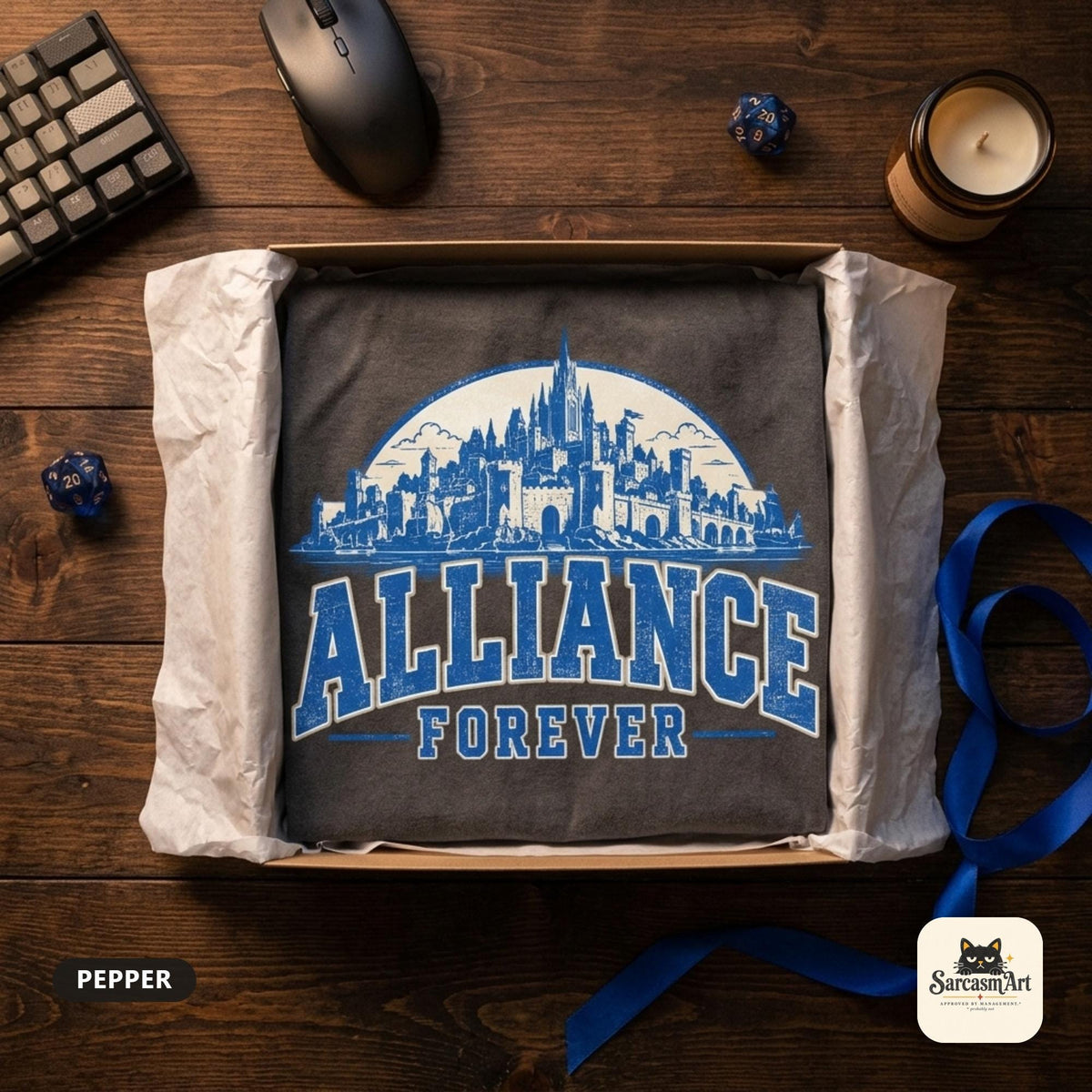 The Pepper "Alliance Forever" World of Warcraft gamer T-shirt by SarcasmArt folded in an open kraft gift box with tissue paper on a dark wooden desk with a keyboard, mouse and blue ribbon – ready to give as a birthday or Christmas gift.