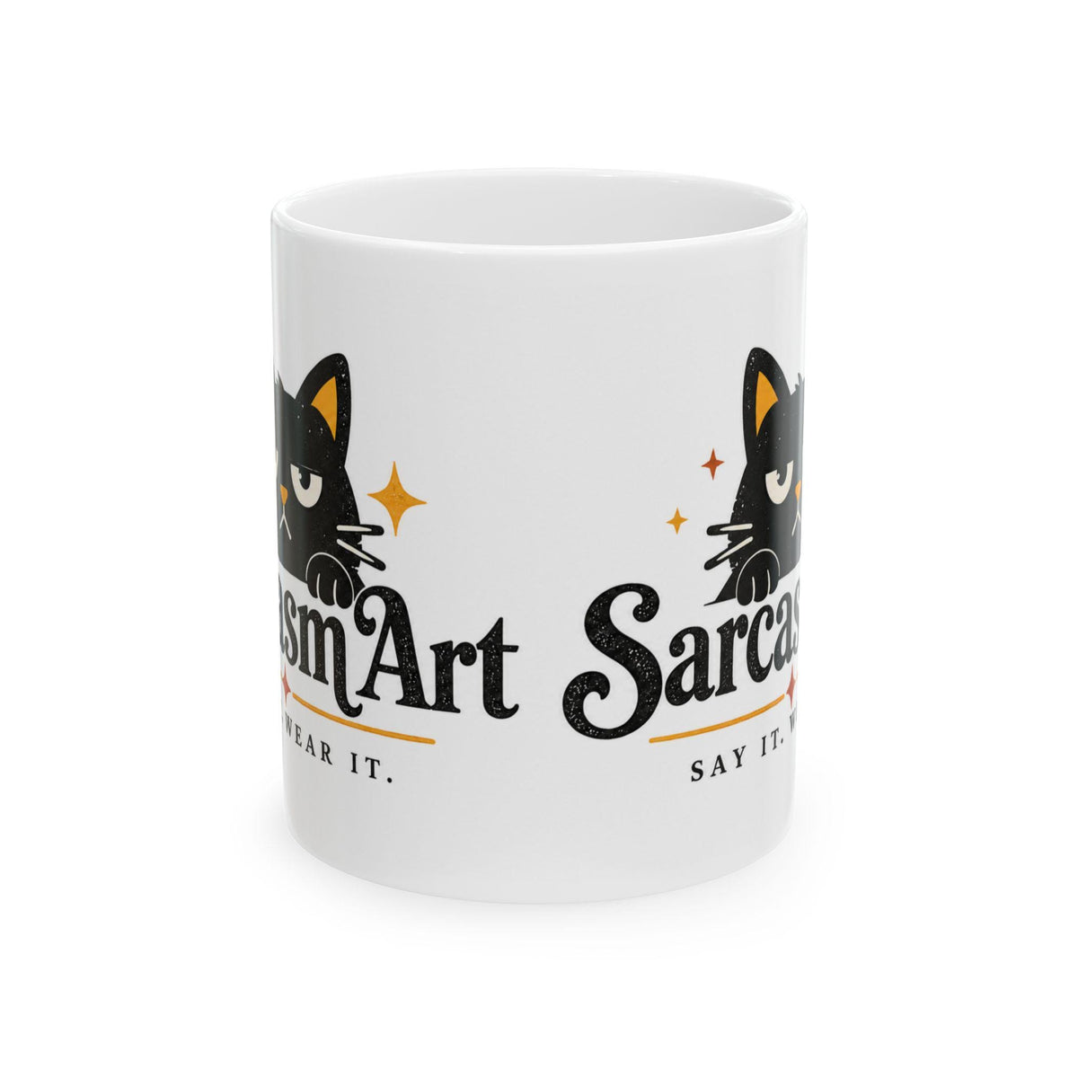 May include: A white ceramic mug featuring a black cat illustration with yellow accents and the text "SarcasmArt" and "SAY IT. WEAR IT." The design includes small orange star icons and a distressed texture on the black lettering.