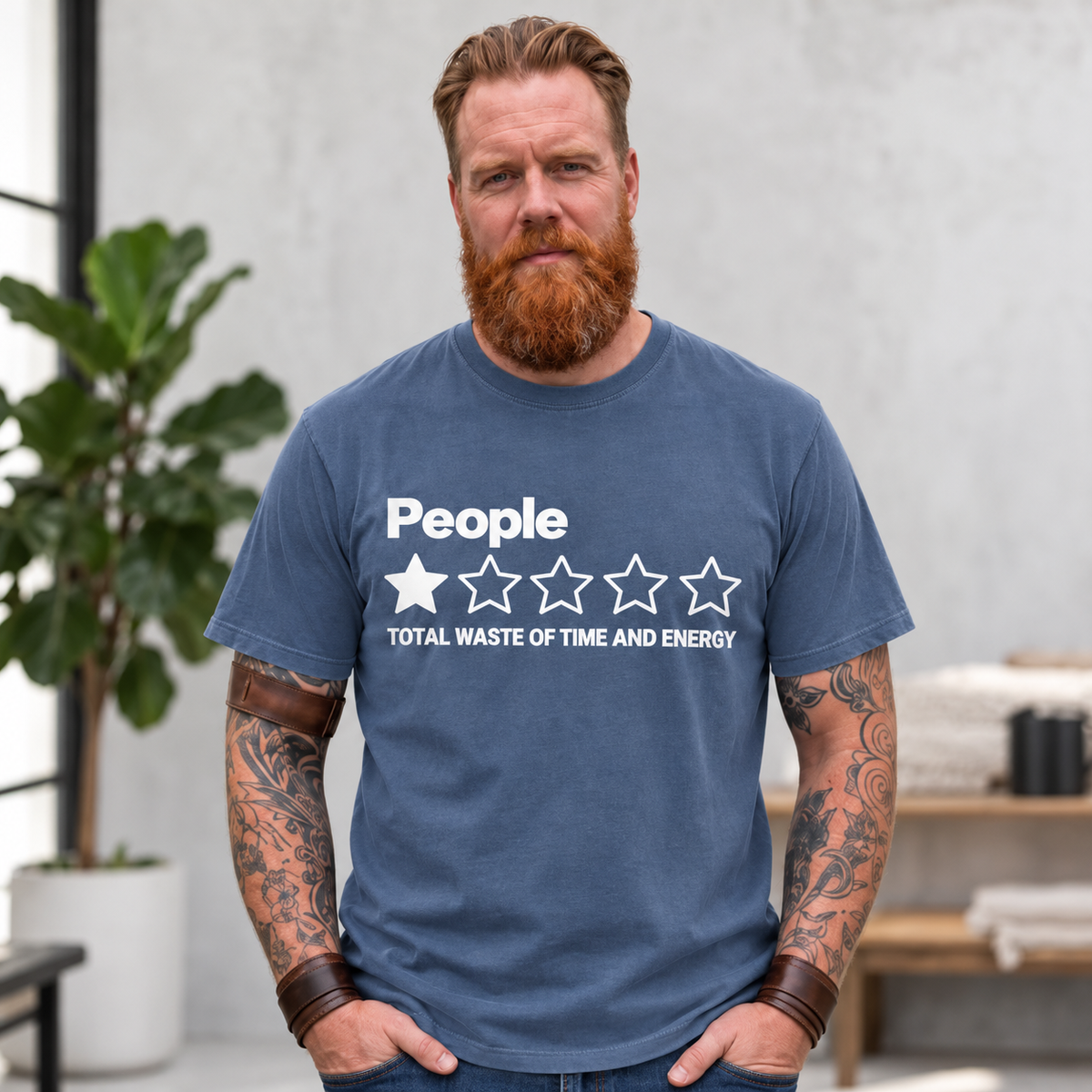 Bearded man wearing the "People – 1 Star, Total Waste of Time and Energy" sarcastic review T-shirt by SarcasmArt in Blue Jean (washed denim blue).